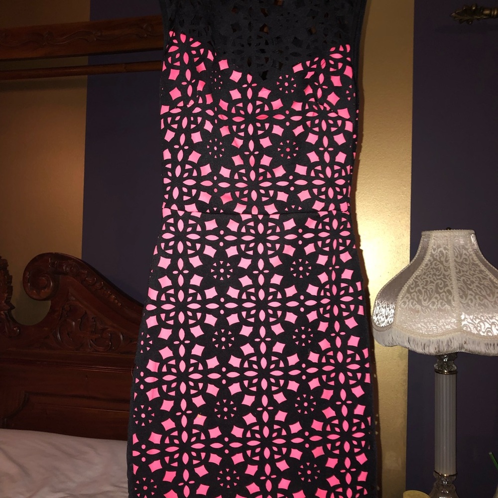 Two cute form fitting cocktail dresses.